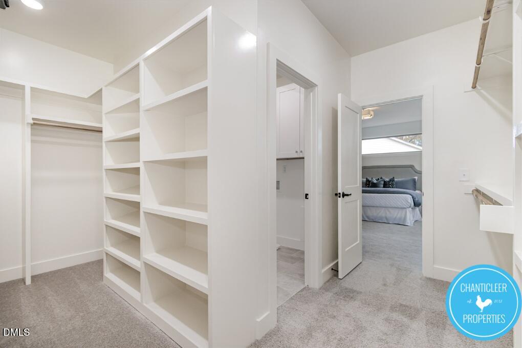 2307 Broad Street Durham, NC 27704 - Photo 17 of 29 a view of a hallway with wooden shelves