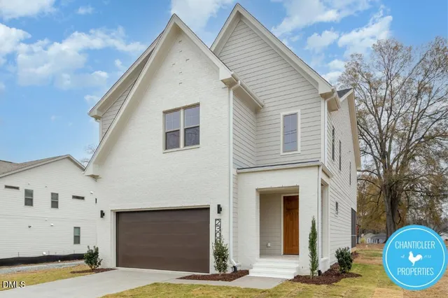 a front view of a house with yard