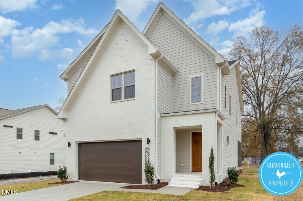 2307 Broad Street Durham, NC 27704 - Photo 2 of 29 a front view of a house with yard