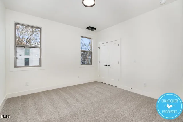 an empty room with windows