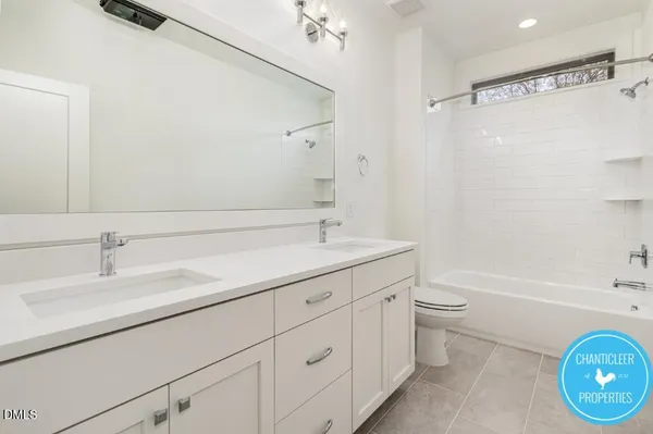 a bathroom with a sink a toilet and a bathtub