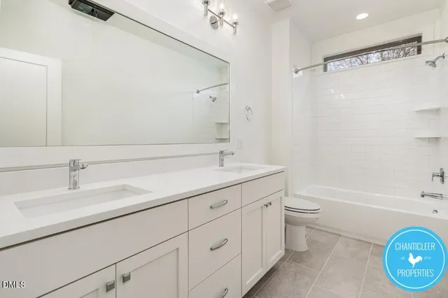 a bathroom with a sink a toilet and a bathtub