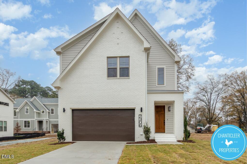 2307 Broad Street Durham, NC 27704 - Photo 5 of 29 a front view of a house with a garden