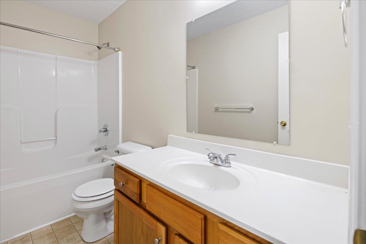 3265 Hebron Court Harrisonburg, VA 22801 - Photo 14 of 30 a bathroom with a sink a toilet and shower