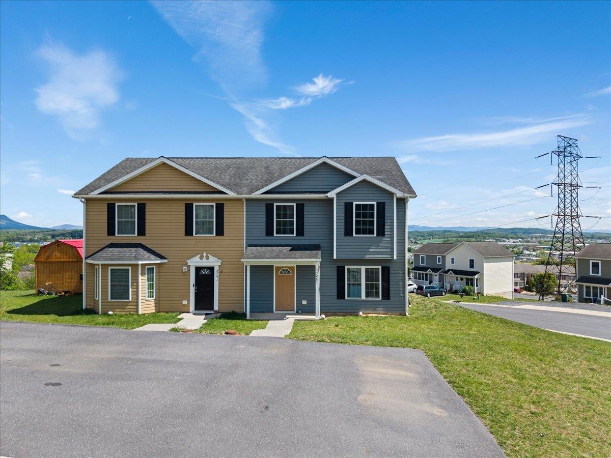 3265 Hebron Court Harrisonburg, VA 22801 - Photo 2 of 30 a front view of a house with a garden and yard