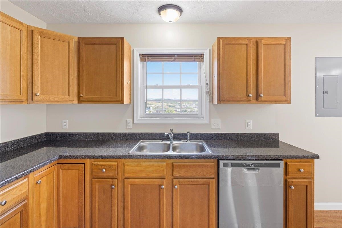 3265 Hebron Court Harrisonburg, VA 22801 - Photo 10 of 30 a kitchen with granite countertop cabinets sink and window