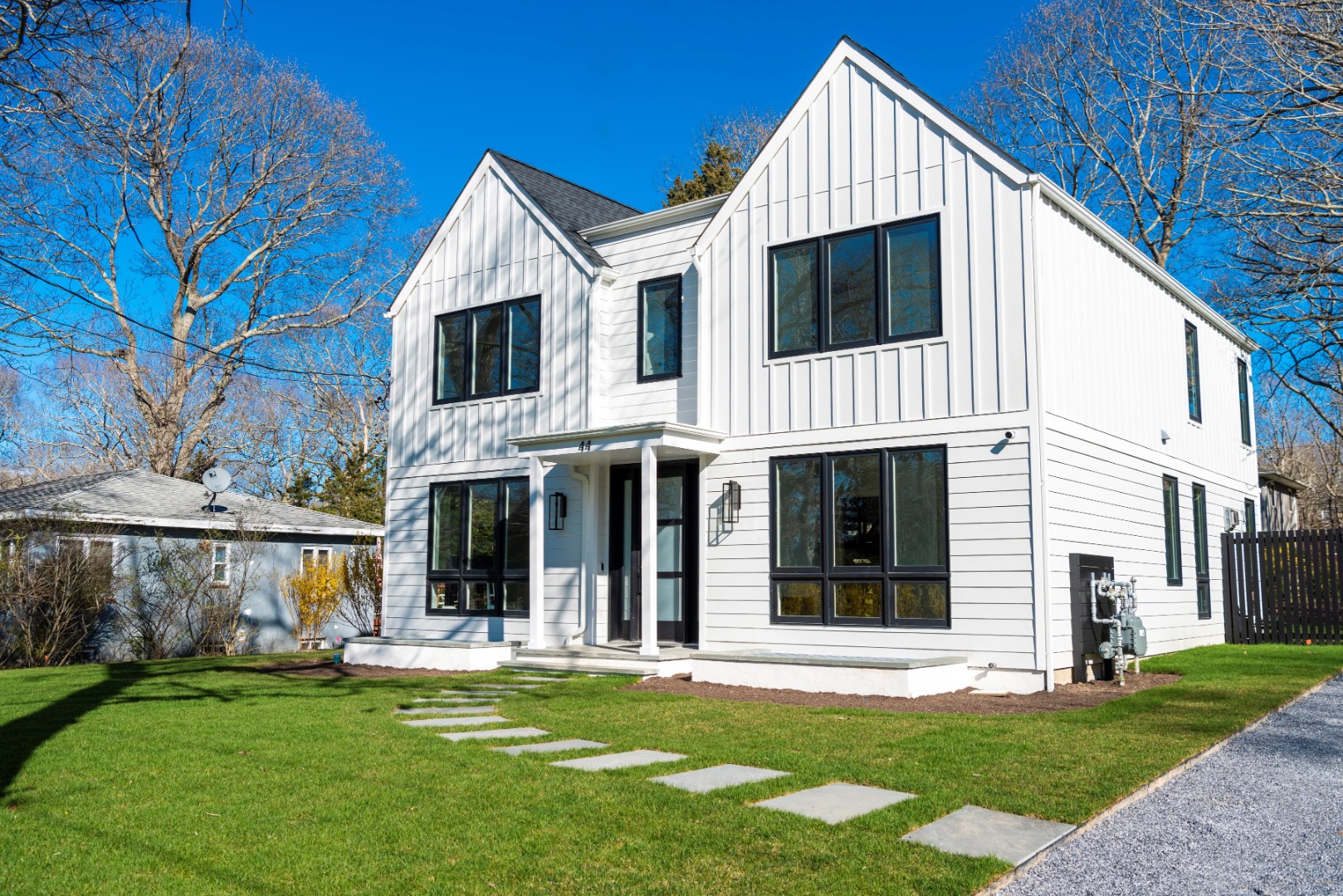 44 Richards Drive Sag Harbor, NY 11963 - Photo 2 of 37 front view of a house with a yard