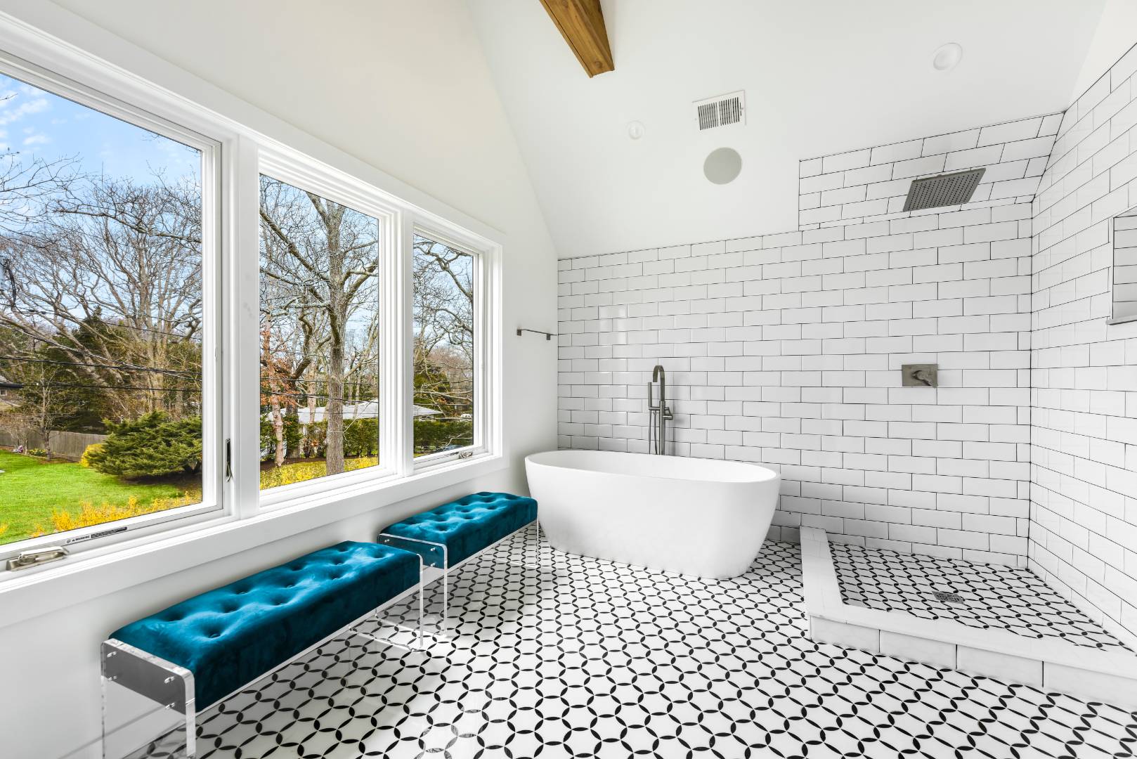 44 Richards Drive Sag Harbor, NY 11963 - Photo 18 of 37 a bathroom with a sink a toilet a window and shower
