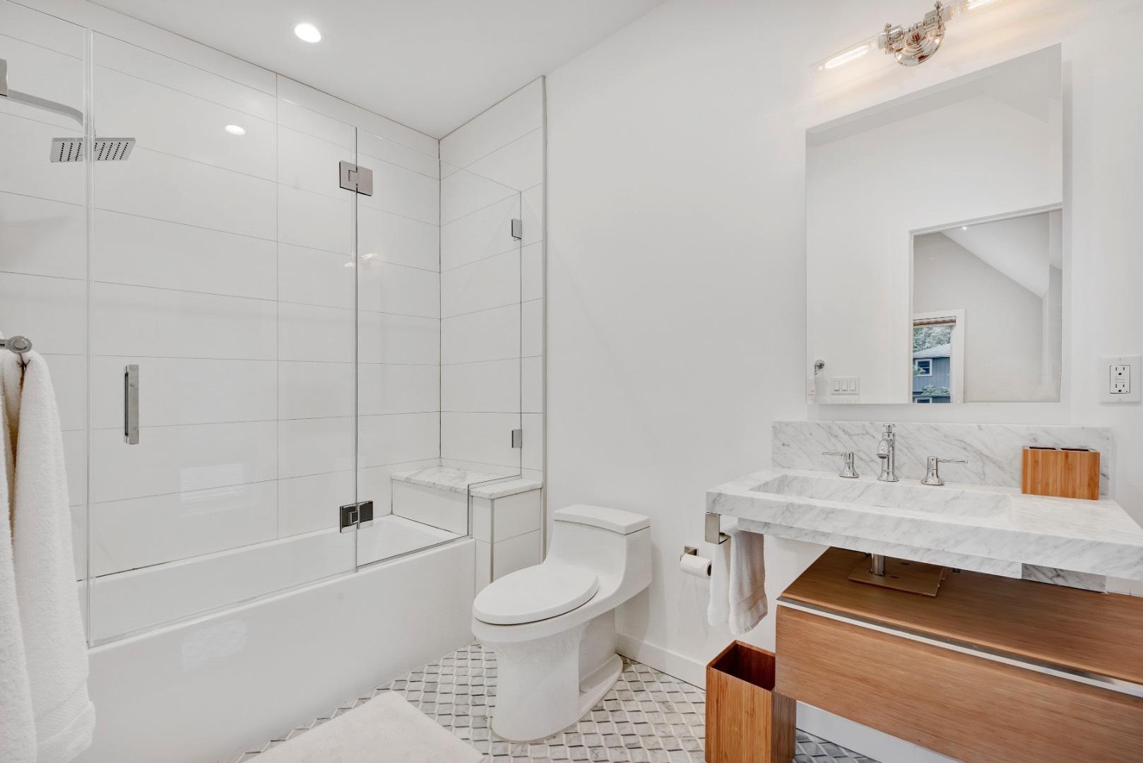 44 Richards Drive Sag Harbor, NY 11963 - Photo 22 of 37 a bathroom with a sink toilet vanity and shower