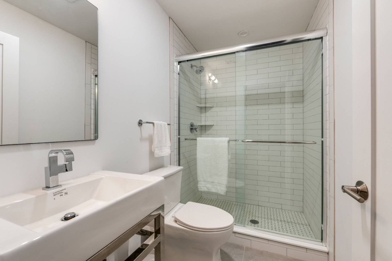 44 Richards Drive Sag Harbor, NY 11963 - Photo 26 of 37 a bathroom with a sink toilet and shower
