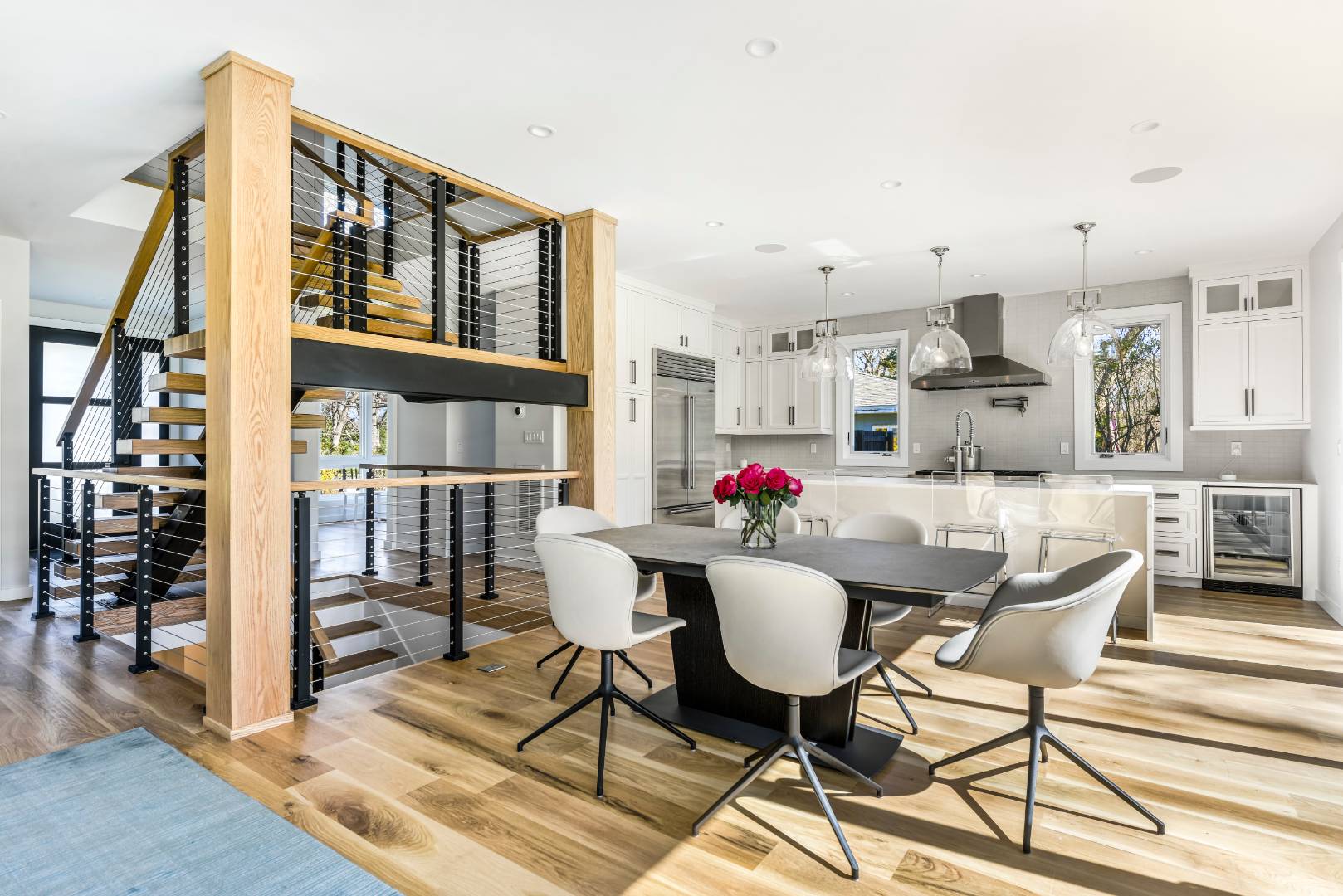44 Richards Drive Sag Harbor, NY 11963 - Photo 5 of 37 a dining room with furniture and a floor to ceiling window