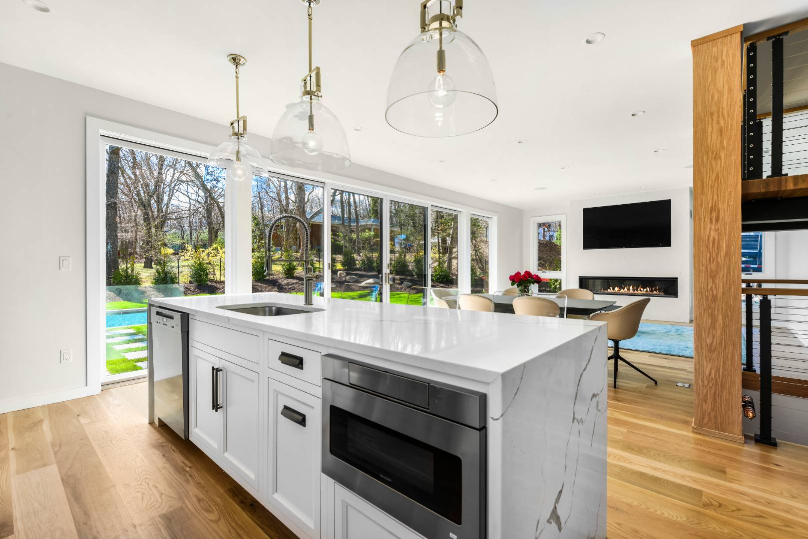 44 Richards Drive Sag Harbor, NY 11963 - Photo 9 of 37 a large white kitchen with a large window