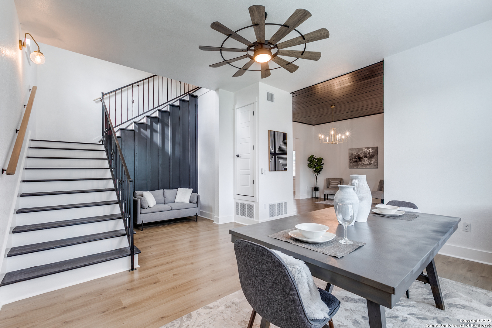 505 Rigsby Avenue San Antonio, TX 78210 - Photo 15 of 29 a view of a dining room with furniture and wooden floor