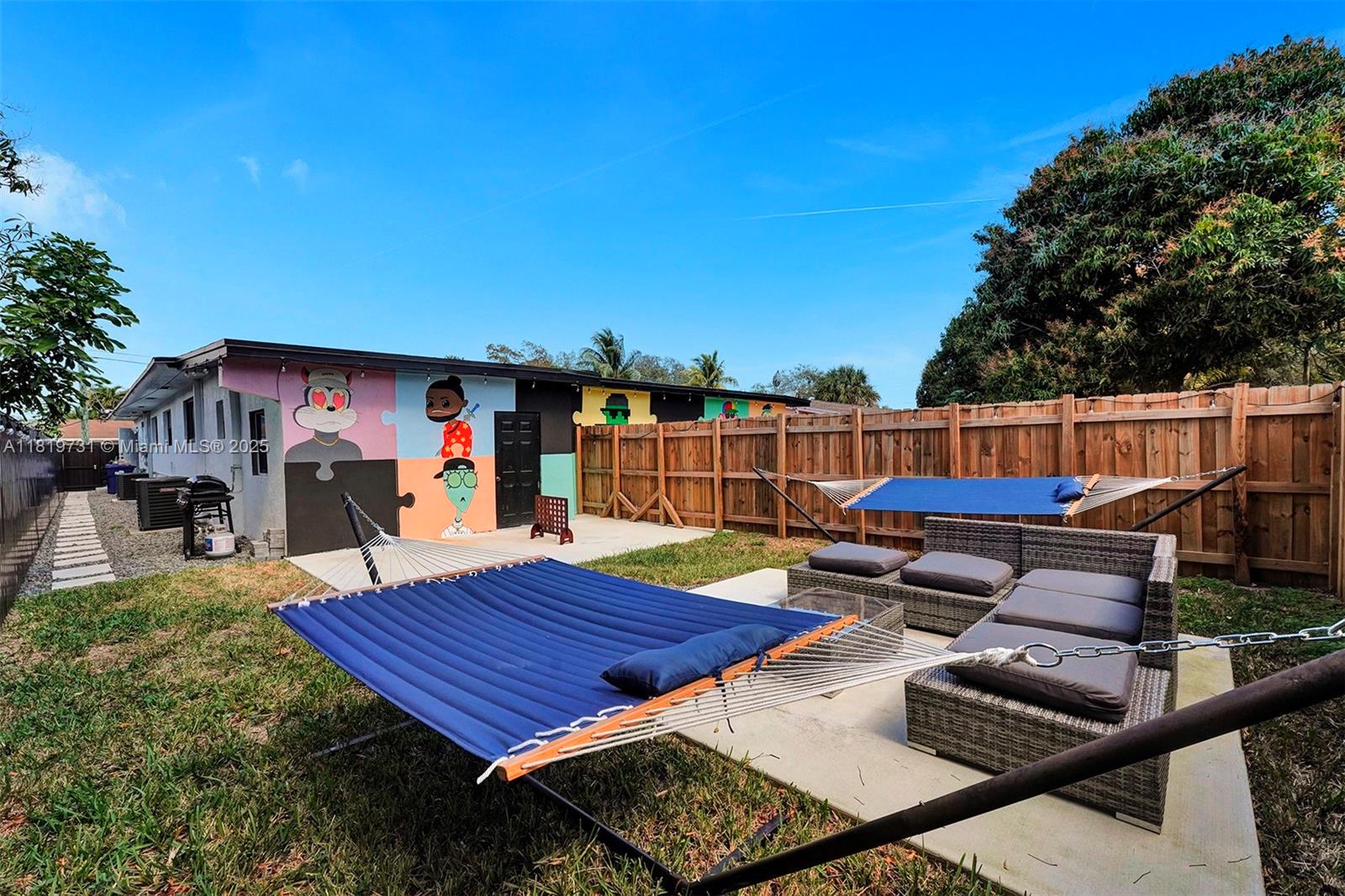 1324 Northeast 151st Street, Unit 1324 Miami, FL 33162 - Photo 20 of 23 a view of a patio with wooden floor