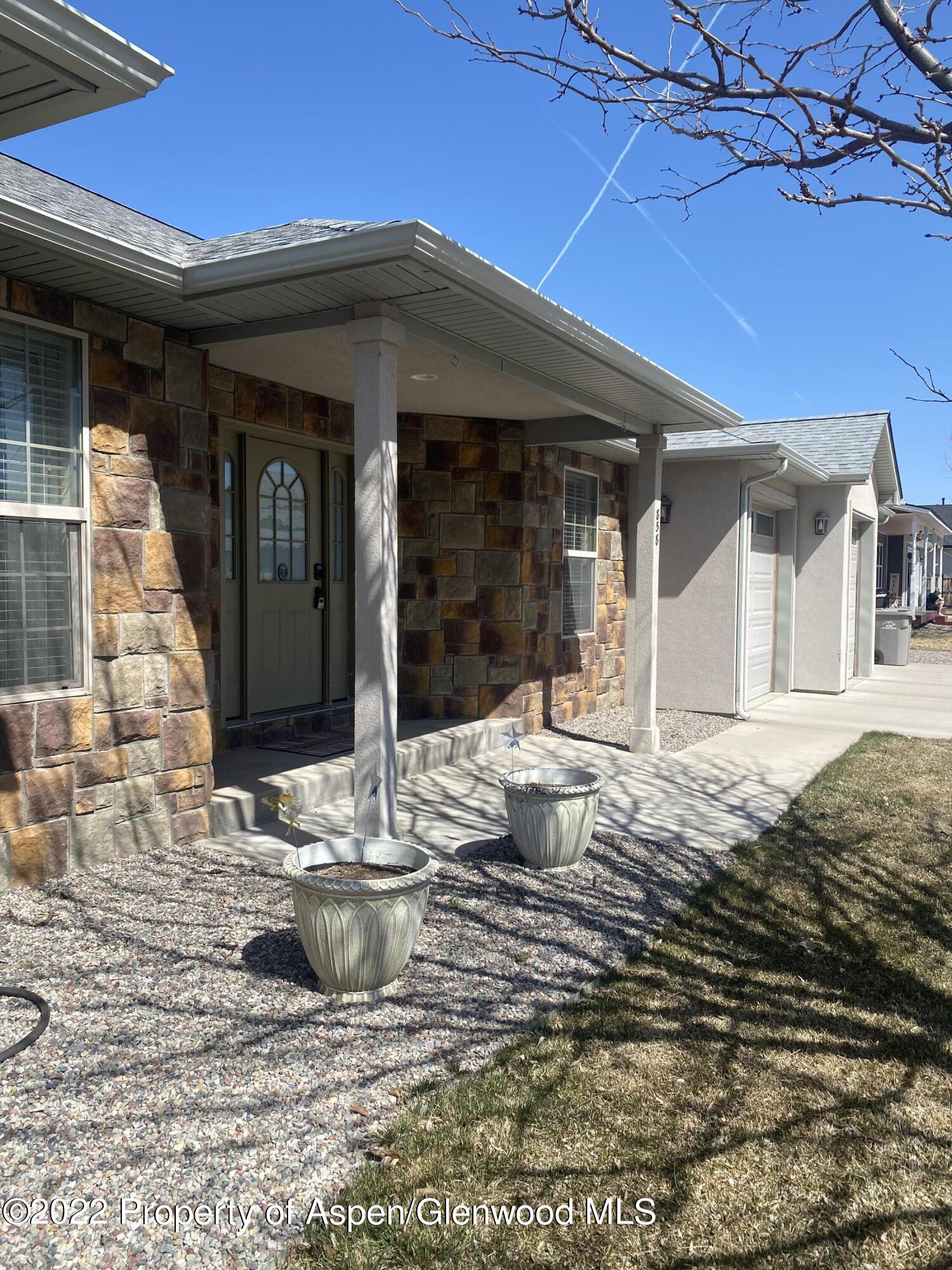 858 East 17th Street Rifle, CO 81650 - Photo 19 of 20 a view of a house with a patio