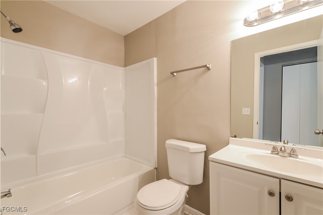 3286 Papaya Road Venice, FL 34293 - Photo 14 of 16 a bathroom with a sink toilet and shower