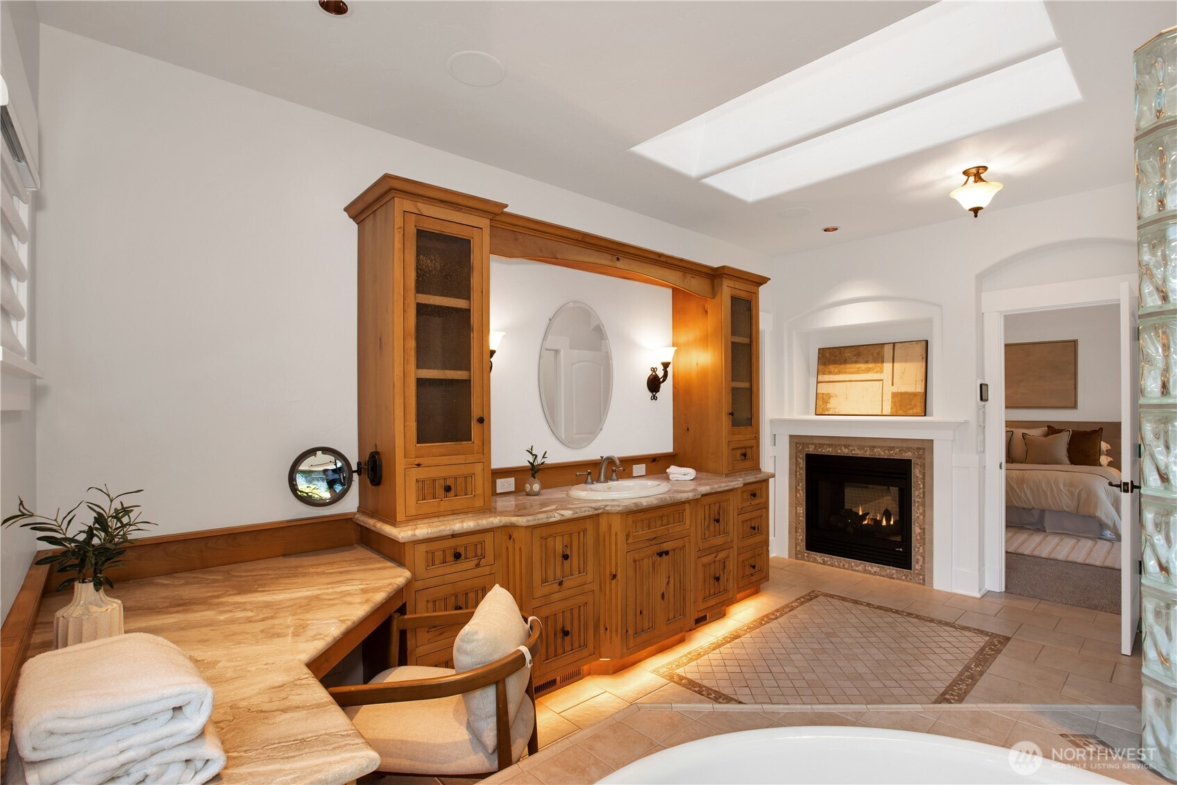 7732 Rich Road Southeast Olympia, WA 98501 - Photo 16 of 40 a living room with furniture a fireplace and a flat screen tv
