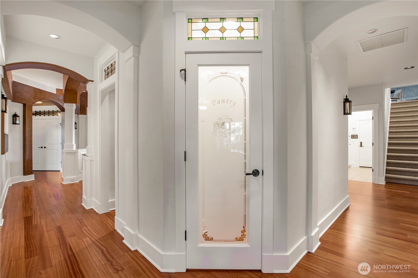 7732 Rich Road Southeast Olympia, WA 98501 - Photo 24 of 40 a view of a hallway with wooden floor and staircase