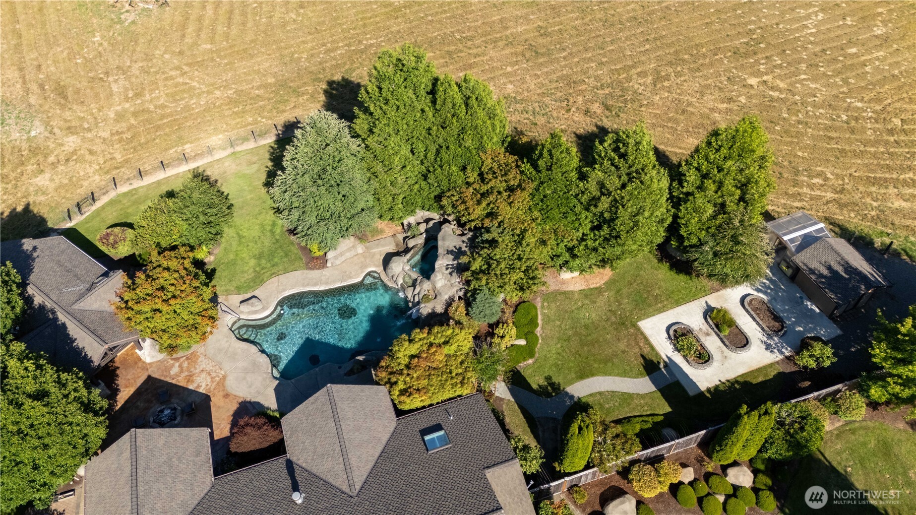 7732 Rich Road Southeast Olympia, WA 98501 - Photo 27 of 40 an aerial view of a house with a yard