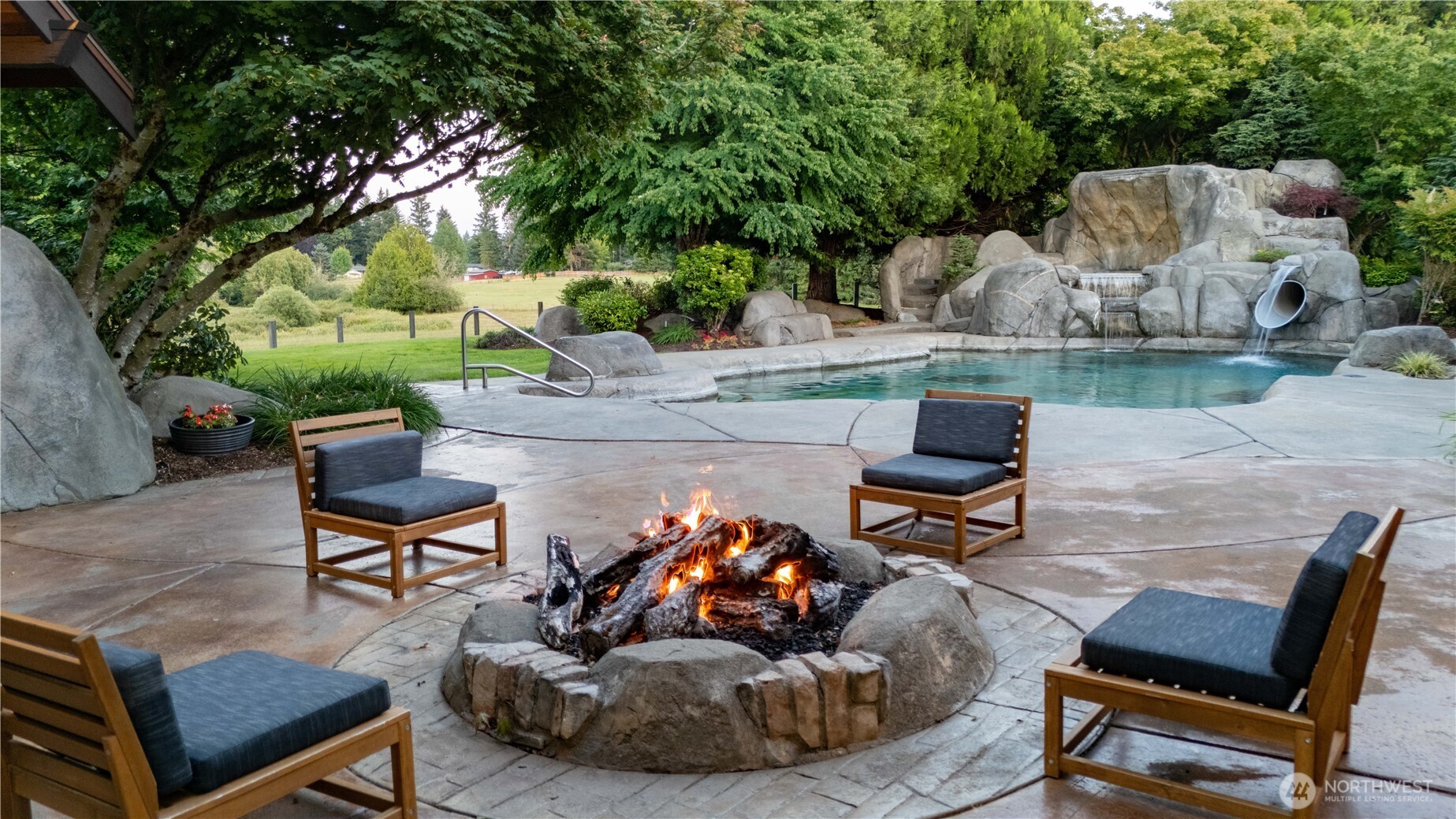 7732 Rich Road Southeast Olympia, WA 98501 - Photo 29 of 40 a backyard of a house with seating space