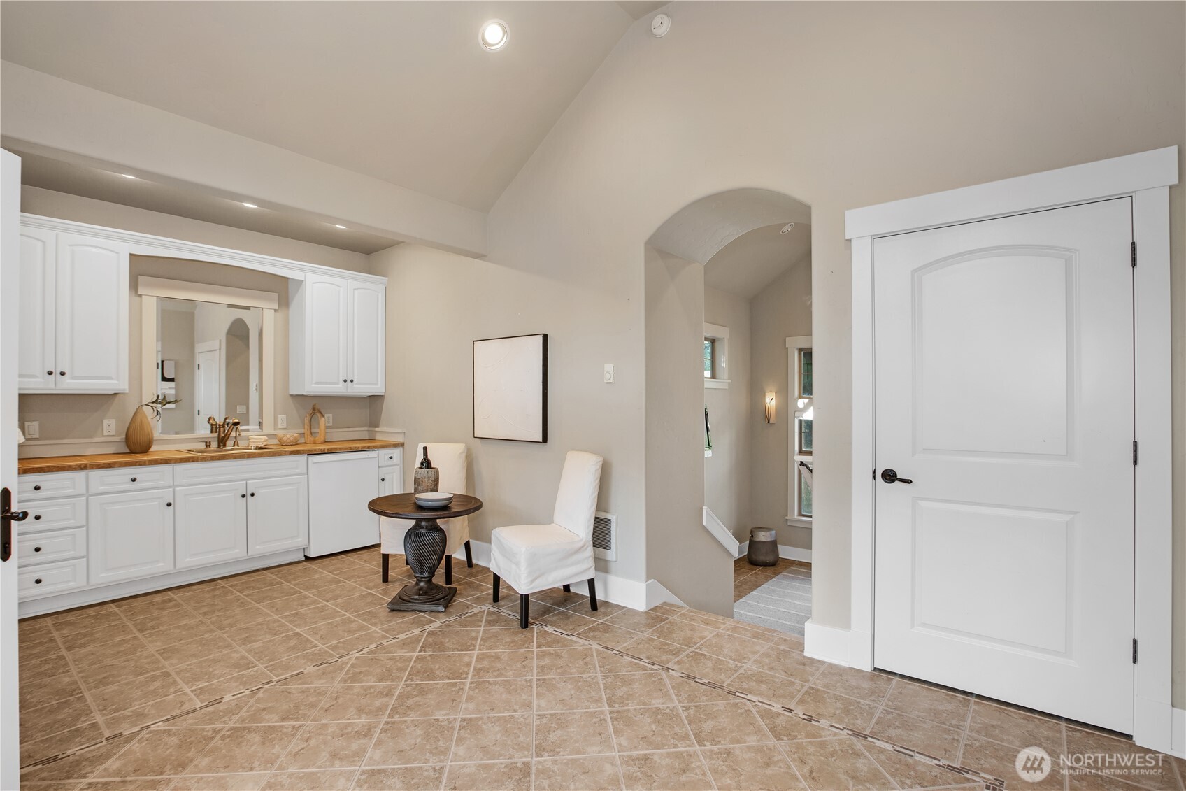 7732 Rich Road Southeast Olympia, WA 98501 - Photo 33 of 40 a large white room with mirror and furniture