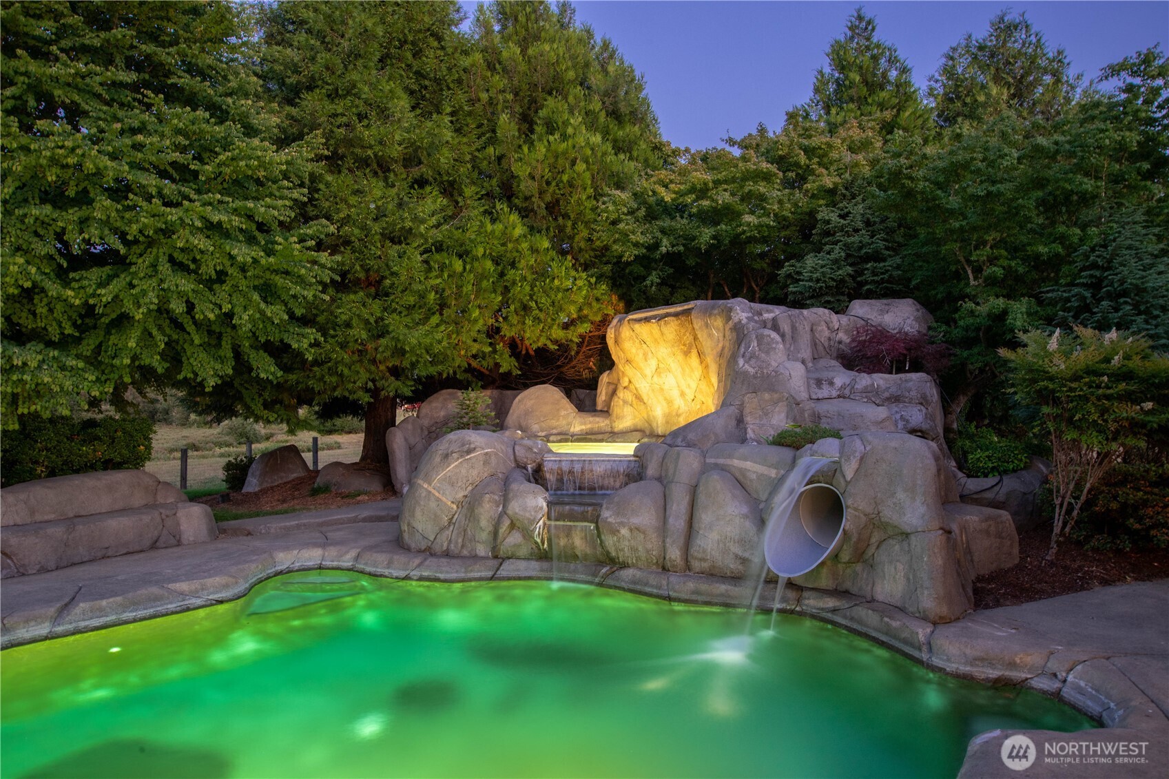 7732 Rich Road Southeast Olympia, WA 98501 - Photo 39 of 40 an aerial view of a house with garden space and swimming pool