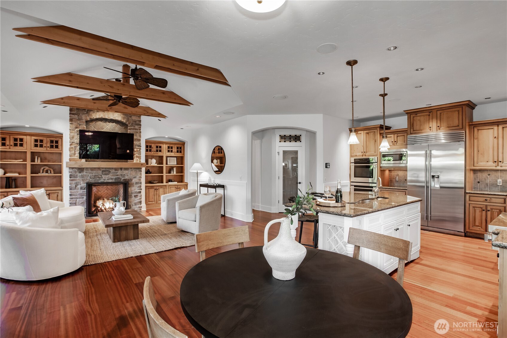 7732 Rich Road Southeast Olympia, WA 98501 - Photo 10 of 40 a kitchen with a table chairs and a living room