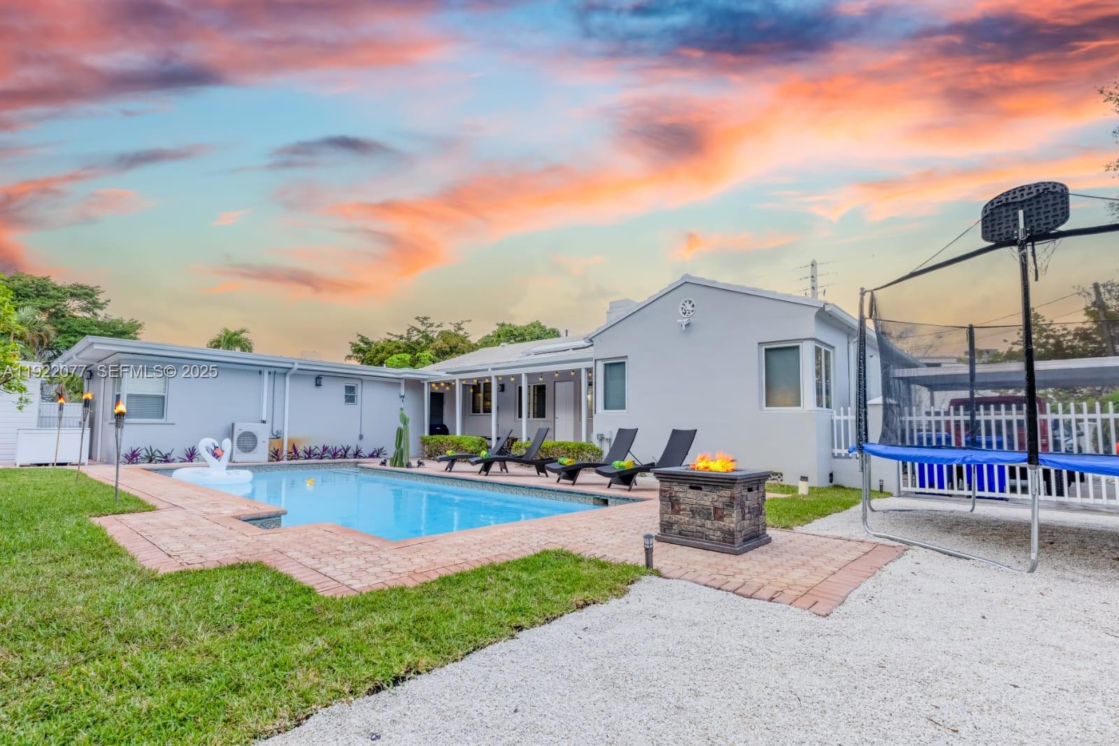 a house view with sitting space and garden space