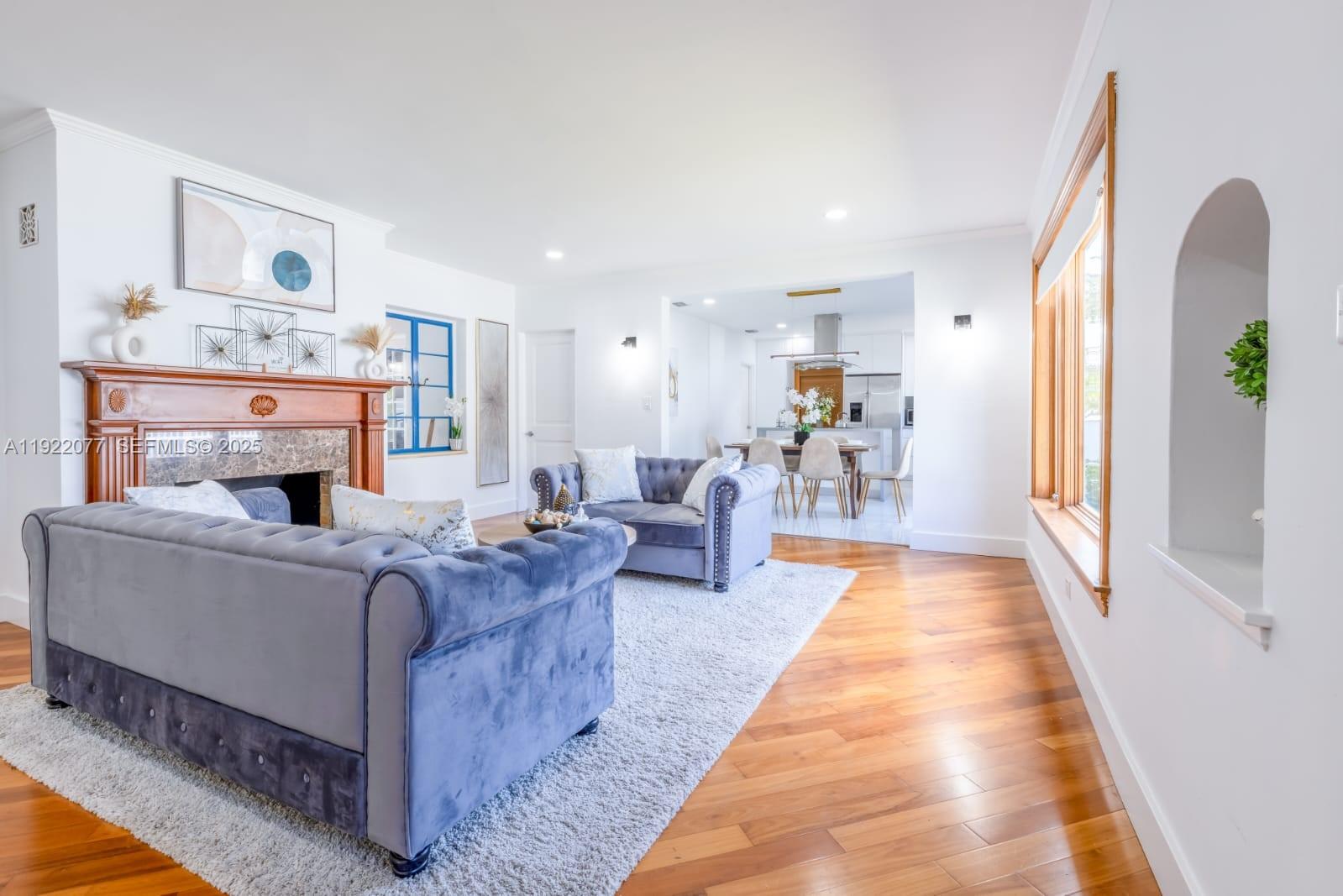 1230 Southwest 22nd Terrace Miami, FL 33145 - Photo 15 of 35 a living room with furniture and a table