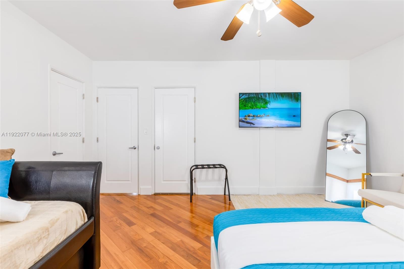 1230 Southwest 22nd Terrace Miami, FL 33145 - Photo 32 of 35 a bedroom with a bed and dresser