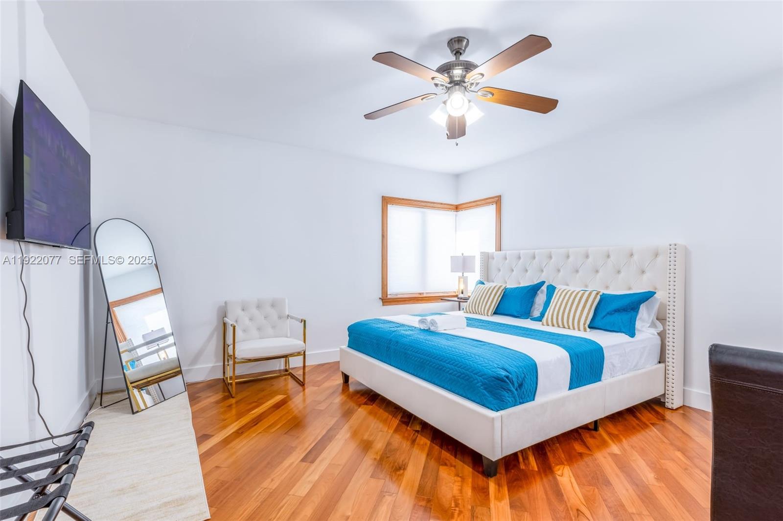 1230 Southwest 22nd Terrace Miami, FL 33145 - Photo 5 of 35 a bedroom with bed and a window