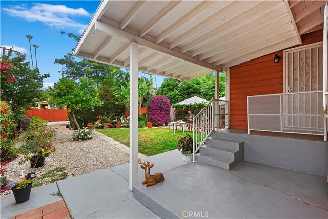 a house view with a garden space