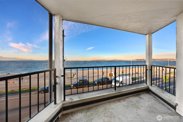 a view of a balcony with city view