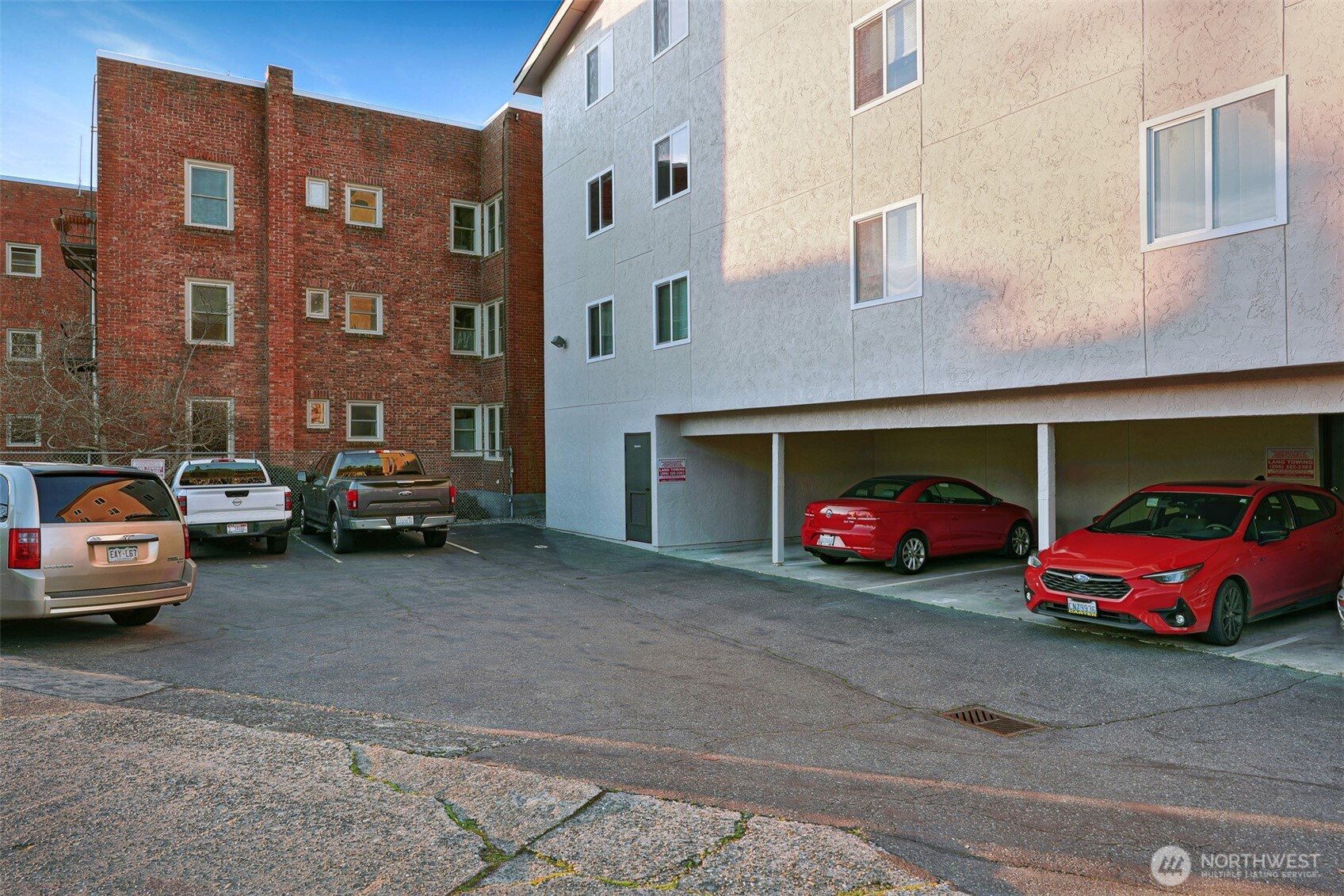 2440 Alki Avenue Southwest Seattle, WA 98116 - Photo 20 of 27 a car parked in front of a building