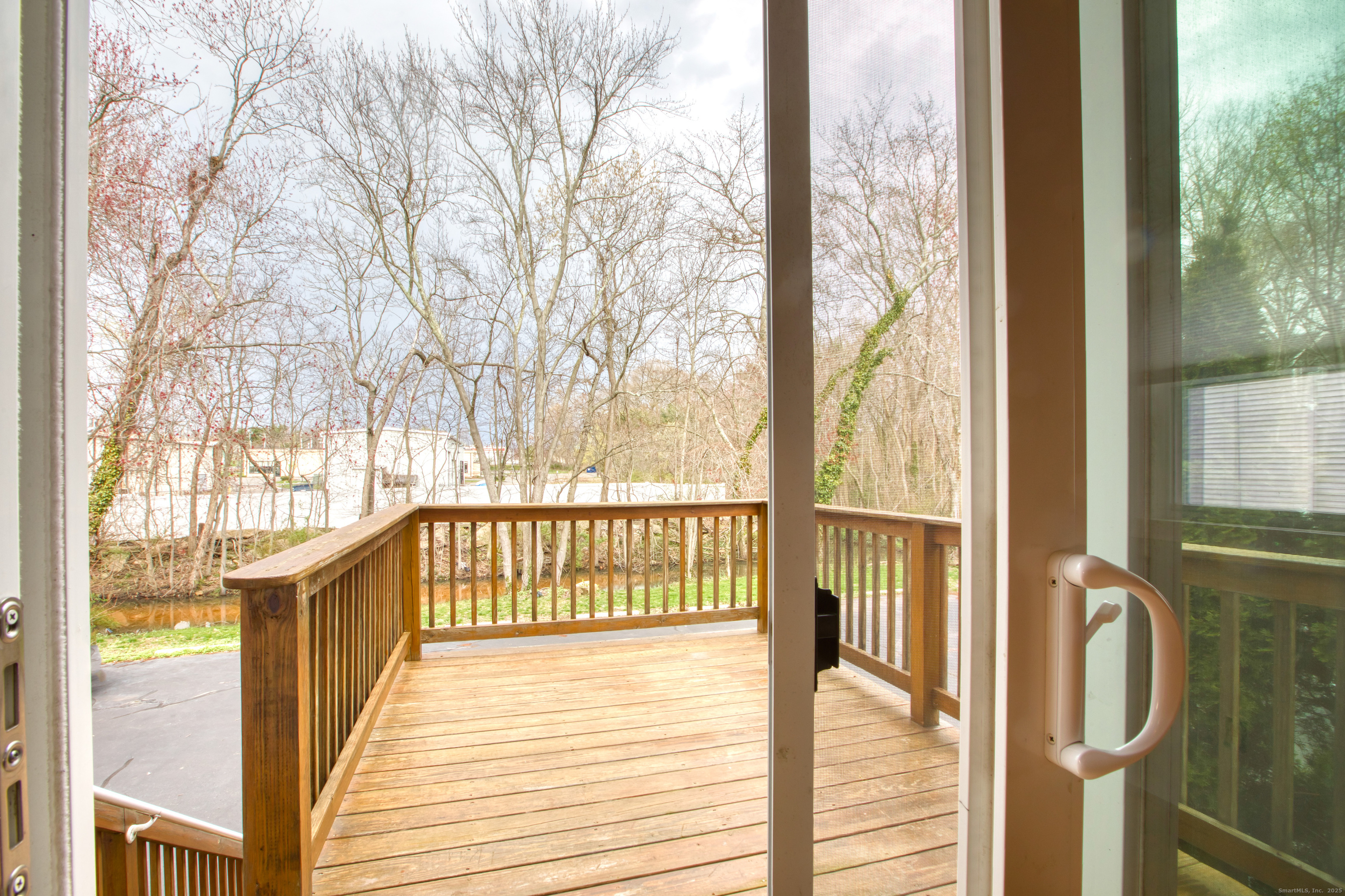 12 Clancy Road, Unit A Branford, CT 06405 - Photo 15 of 31 a view of a balcony with wooden floor