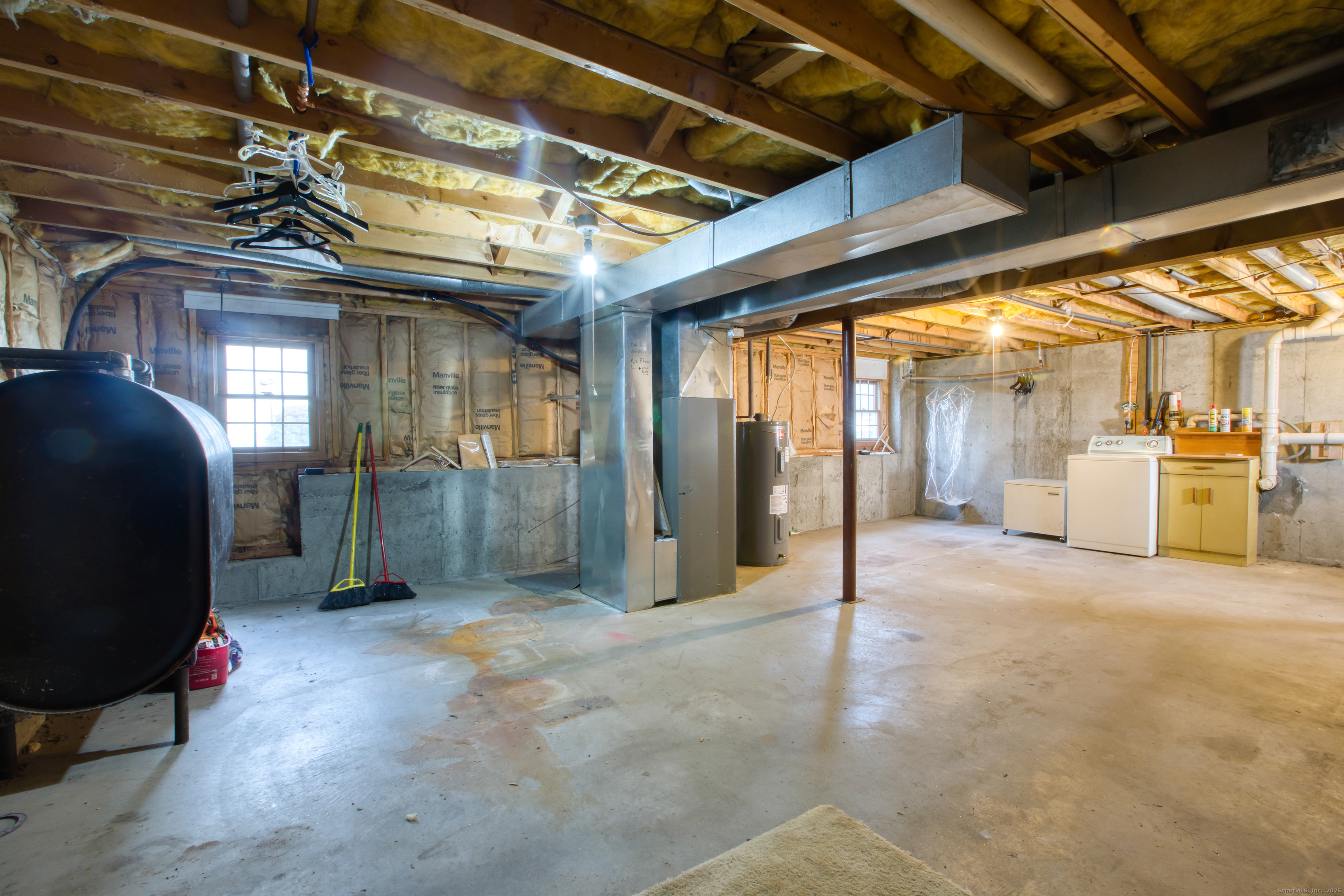 12 Clancy Road, Unit A Branford, CT 06405 - Photo 25 of 31 a view of a garage with refrigerator