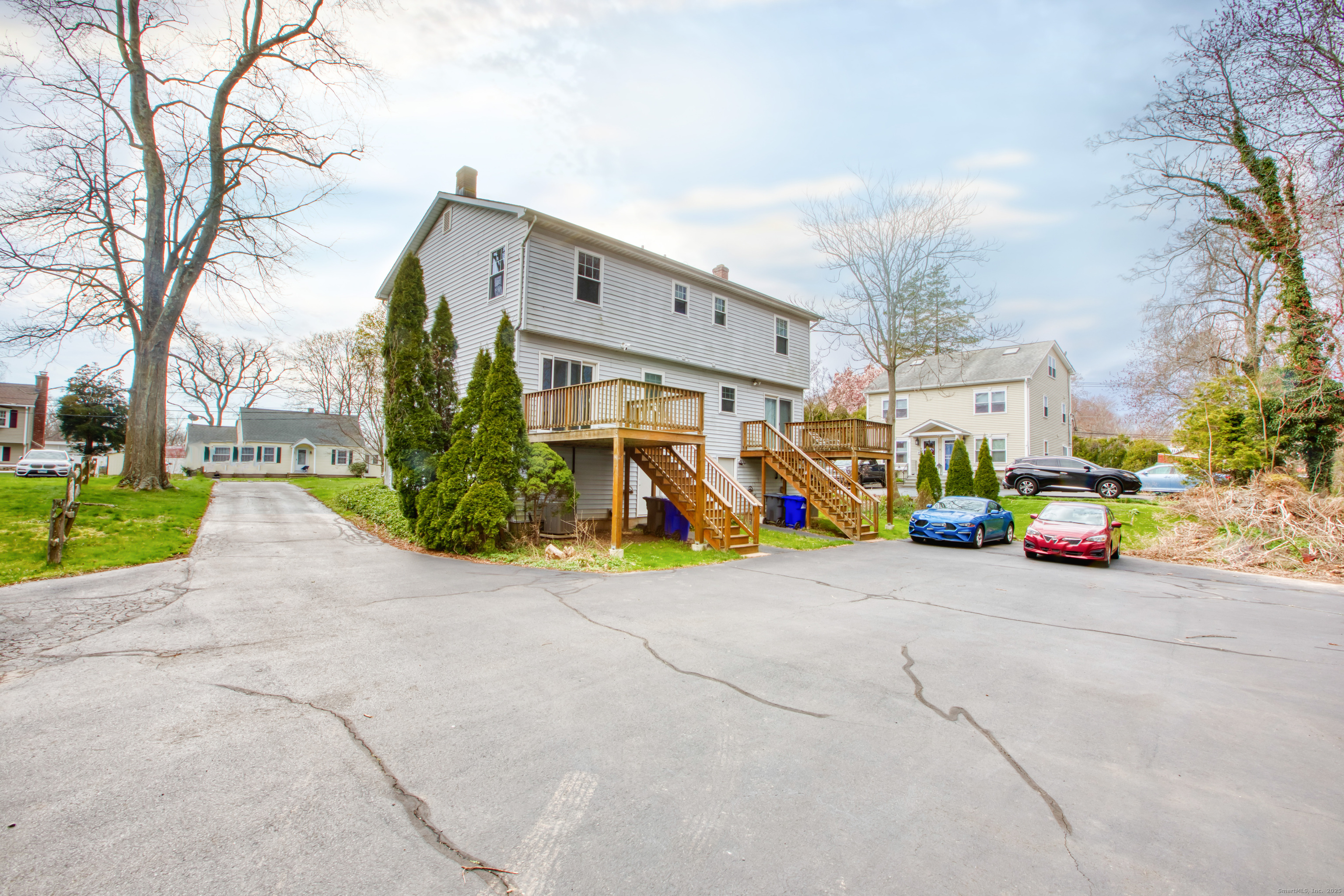 12 Clancy Road, Unit A Branford, CT 06405 - Photo 27 of 31 a view of a street with cars
