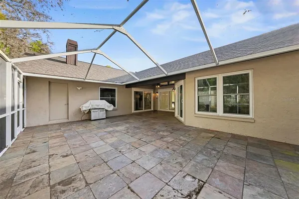 a view of a back yard of the house