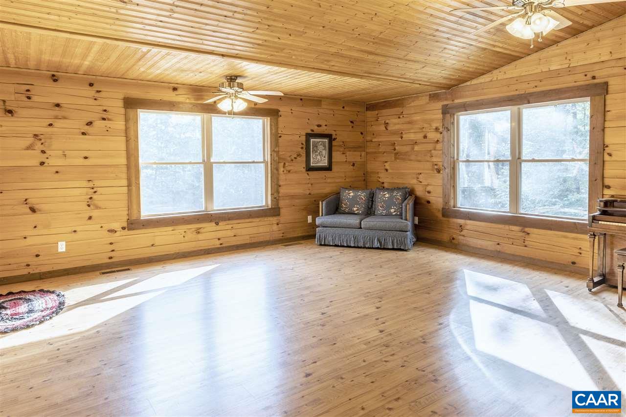 703 George James Loop Radiant, VA 22732 - Photo 12 of 48 a living room with hard wood floor and a large window