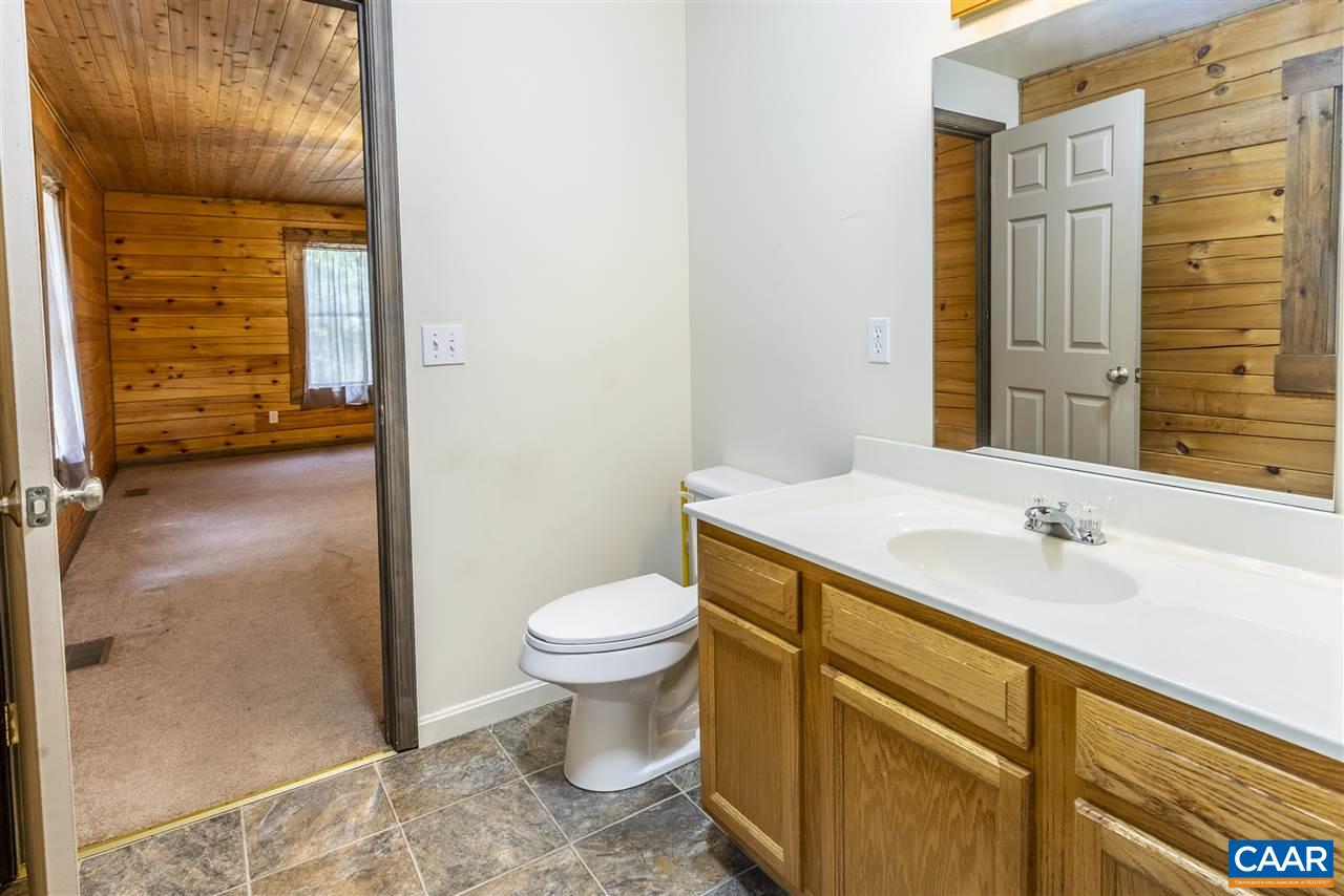 703 George James Loop Radiant, VA 22732 - Photo 27 of 48 a bathroom with a sink and a mirror