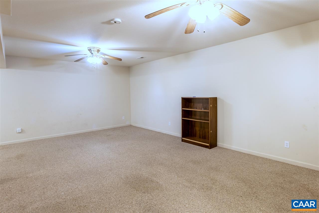 703 George James Loop Radiant, VA 22732 - Photo 32 of 48 en empty room with chandelier fan and window