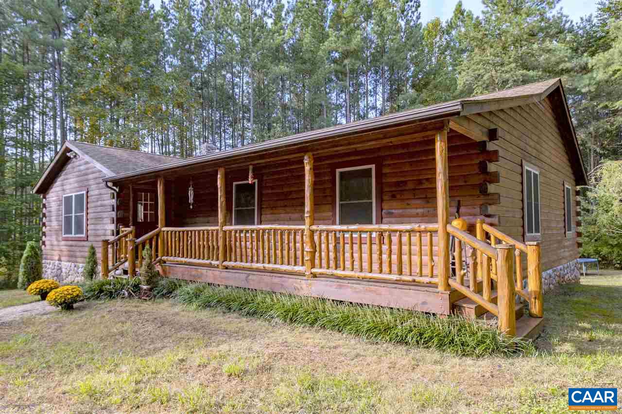 703 George James Loop Radiant, VA 22732 - Photo 6 of 48 a view of a house with a small yard and wooden fence