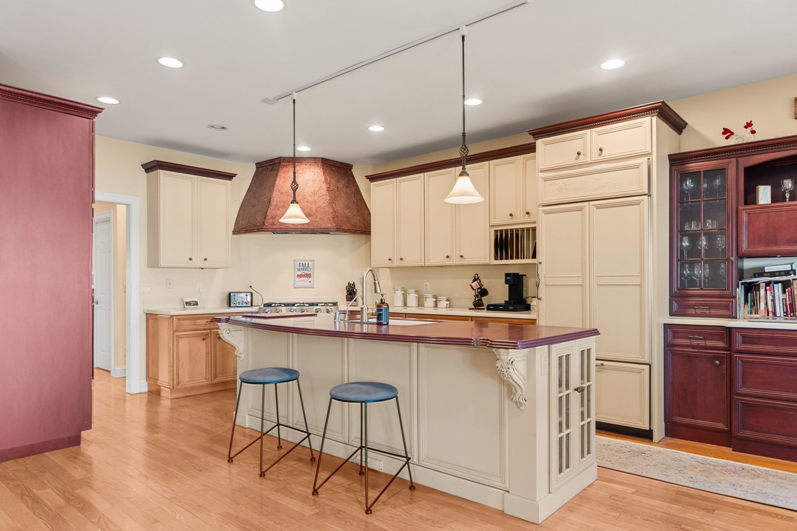 2601 North 3653rd Road Sheridan, IL 60551 - Photo 12 of 85 a kitchen with kitchen island a stove a sink a refrigerator and chairs