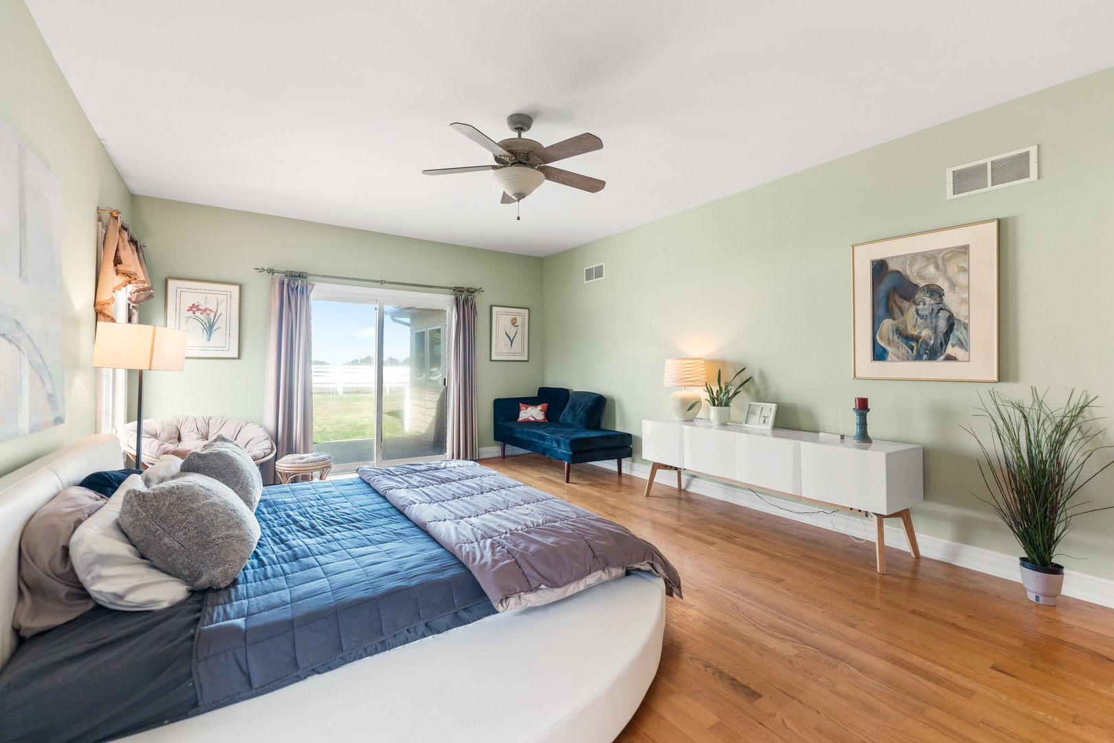 2601 North 3653rd Road Sheridan, IL 60551 - Photo 19 of 85 a bedroom with a bed and wooden floor