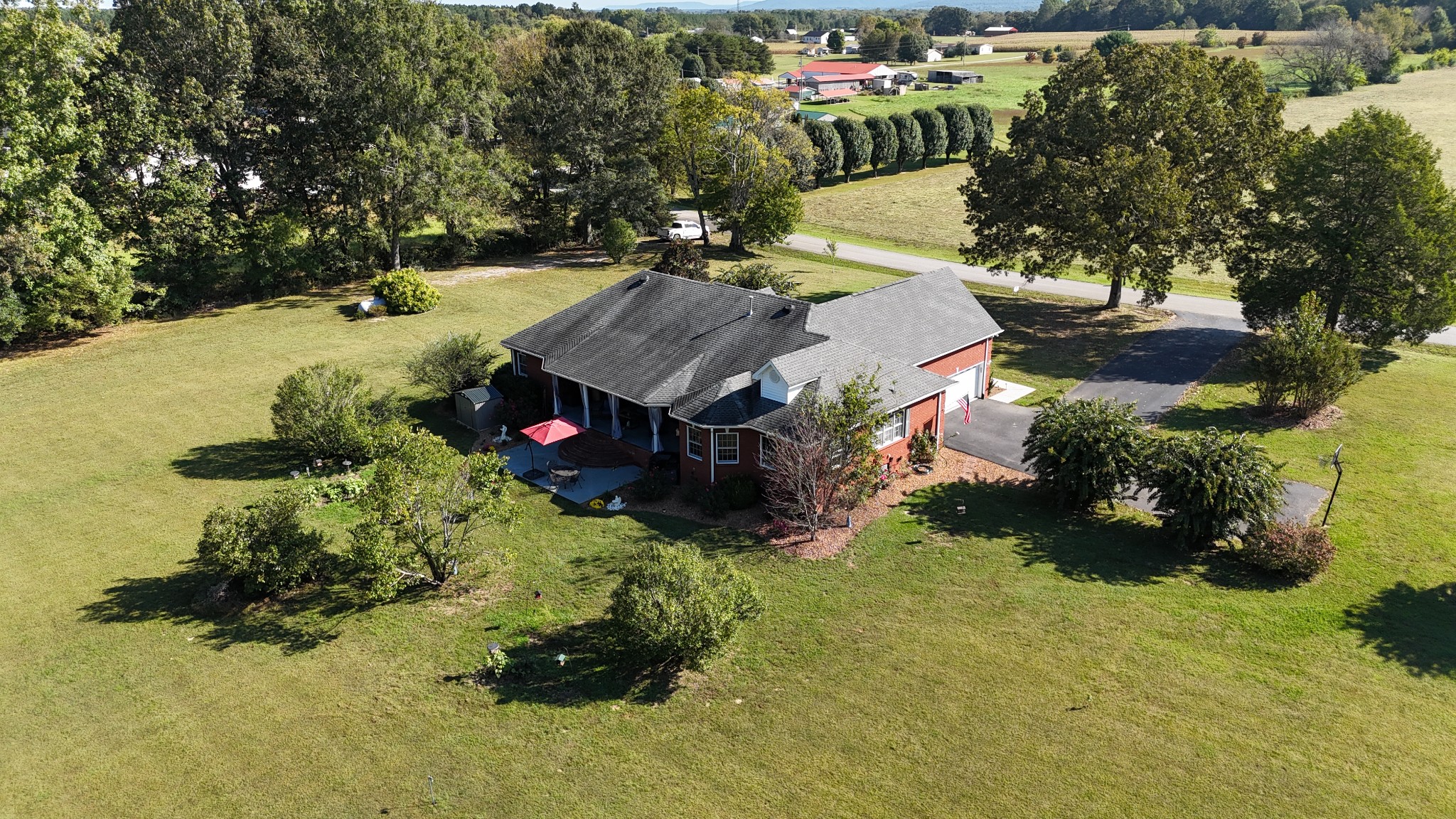 2828 Bains Road Hillsboro, TN 37342 - Photo 59 of 69 an aerial view of a house with a yard and lake