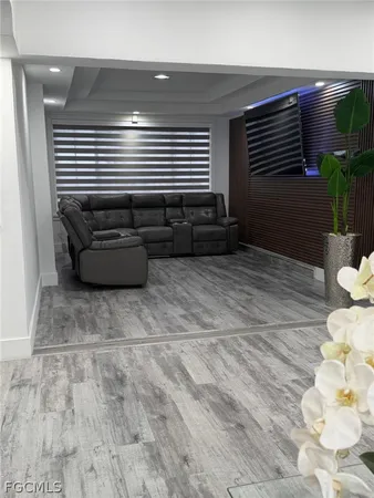 a living room with furniture and a couch