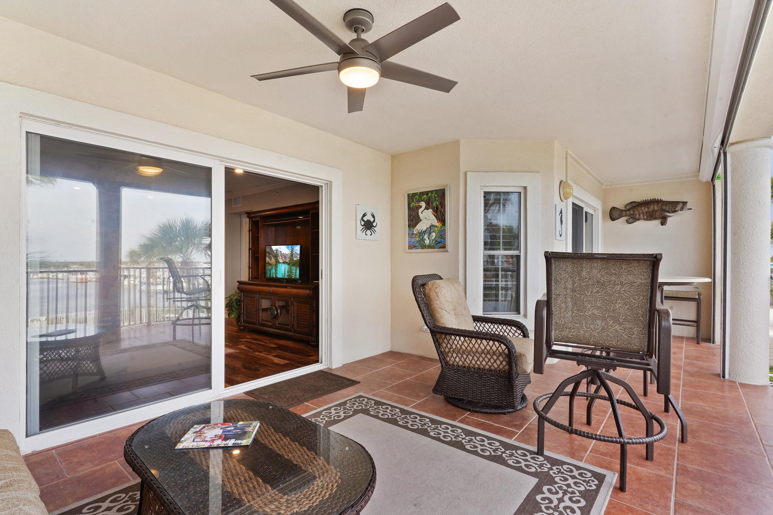 33 Comares Avenue, Unit 203 St. Augustine, FL 32080 - Photo 28 of 39 Sunroom / solarium featuring tile patterned floors