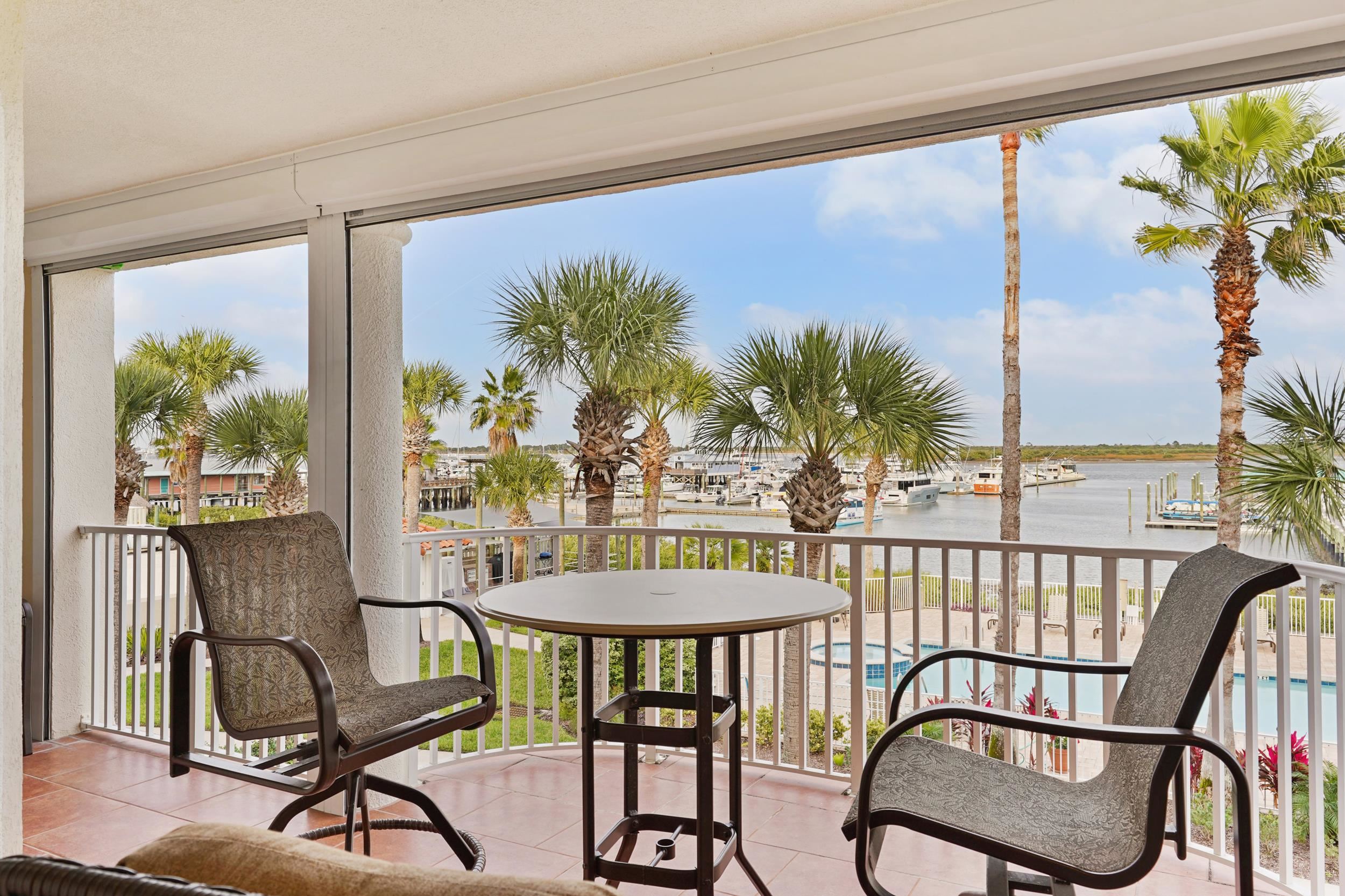 33 Comares Avenue, Unit 203 St. Augustine, FL 32080 - Photo 29 of 39 Sunroom / solarium with a water view