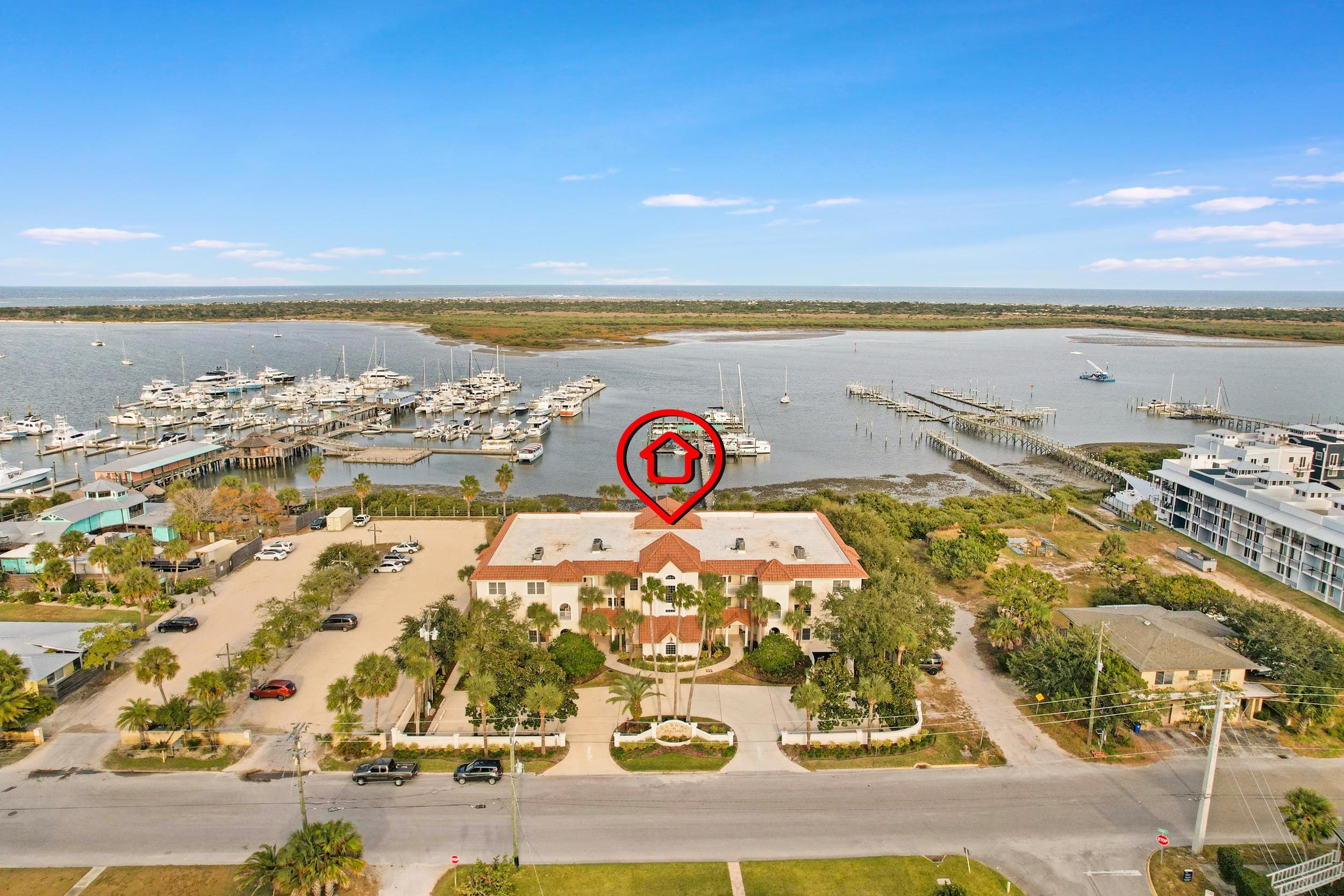 33 Comares Avenue, Unit 203 St. Augustine, FL 32080 - Photo 38 of 39 Drone / aerial view of numerous boat docks and a large body of water