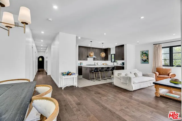 a view of livingroom with hardwood floor and hallway